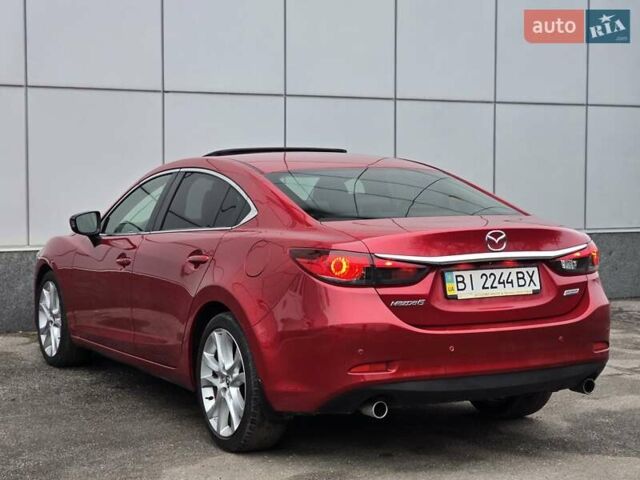 Красный Мазда 6, объемом двигателя 2.49 л и пробегом 190 тыс. км за 11700 $, фото 4 на Automoto.ua