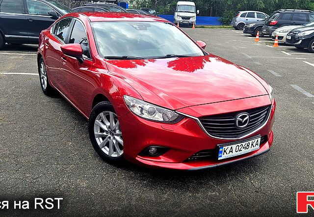 Красный Мазда 6, объемом двигателя 2 л и пробегом 170 тыс. км за 12500 $, фото 1 на Automoto.ua