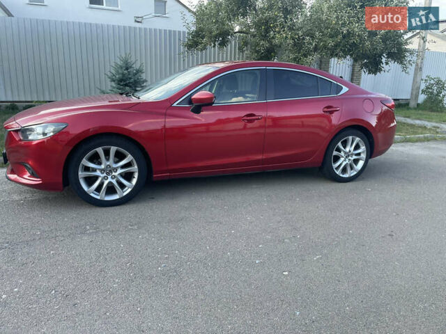Червоний Мазда 6, об'ємом двигуна 2 л та пробігом 225 тис. км за 12300 $, фото 2 на Automoto.ua