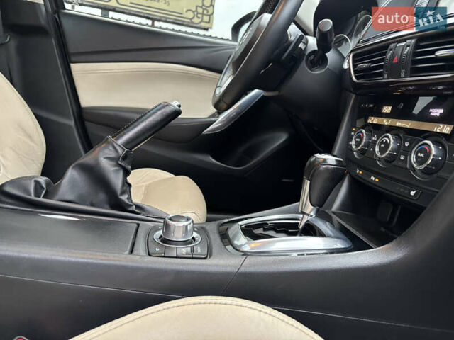 Красный Мазда 6, объемом двигателя 2.49 л и пробегом 175 тыс. км за 12590 $, фото 46 на Automoto.ua