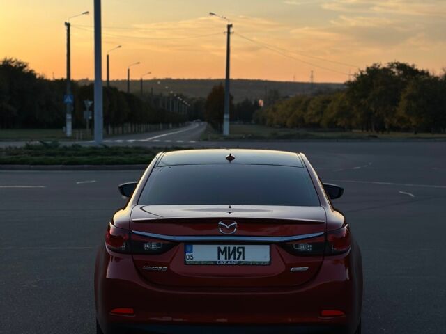 Красный Мазда 6, объемом двигателя 2.5 л и пробегом 128 тыс. км за 12300 $, фото 4 на Automoto.ua