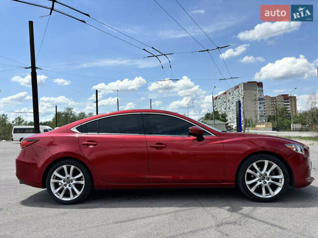 Красный Мазда 6, объемом двигателя 2.5 л и пробегом 205 тыс. км за 12300 $, фото 1 на Automoto.ua