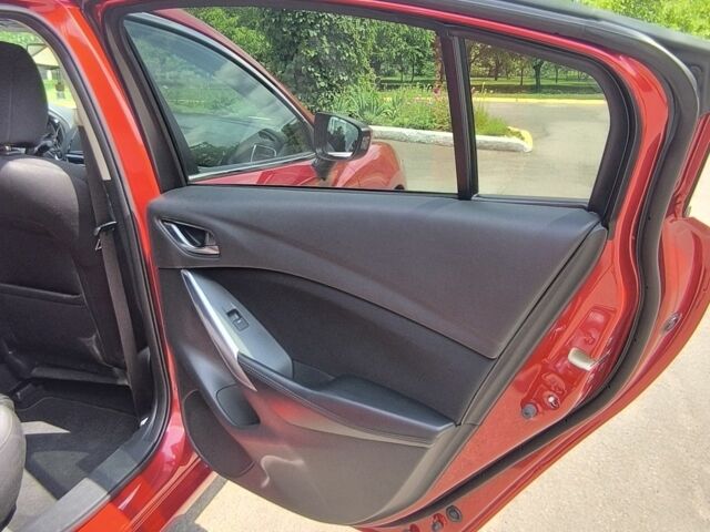 Красный Мазда 6, объемом двигателя 2 л и пробегом 113 тыс. км за 14900 $, фото 16 на Automoto.ua