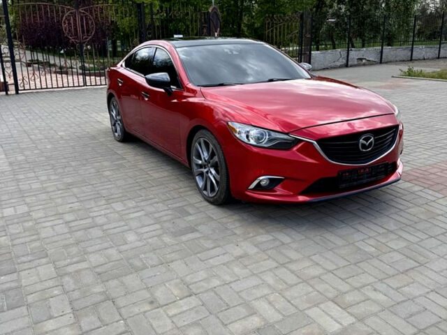 Красный Мазда 6, объемом двигателя 2.5 л и пробегом 127 тыс. км за 13000 $, фото 1 на Automoto.ua