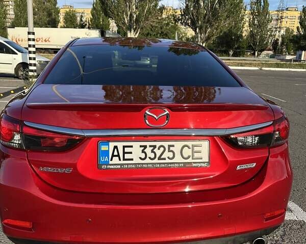 Красный Мазда 6, объемом двигателя 2 л и пробегом 124 тыс. км за 15500 $, фото 4 на Automoto.ua