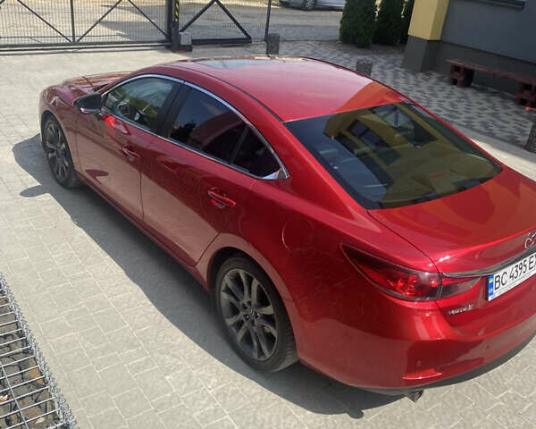 Красный Мазда 6, объемом двигателя 2.49 л и пробегом 289 тыс. км за 14000 $, фото 4 на Automoto.ua