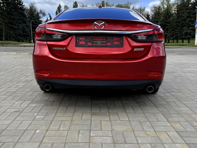 Красный Мазда 6, объемом двигателя 2.5 л и пробегом 127 тыс. км за 13000 $, фото 3 на Automoto.ua