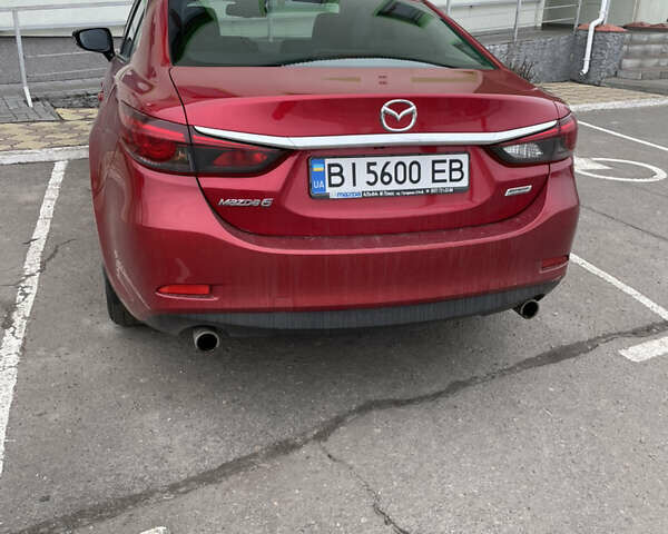 Красный Мазда 6, объемом двигателя 2.49 л и пробегом 226 тыс. км за 15200 $, фото 1 на Automoto.ua