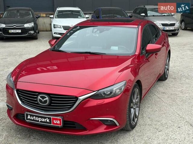 Красный Мазда 6, объемом двигателя 2.5 л и пробегом 270 тыс. км за 12640 $, фото 1 на Automoto.ua