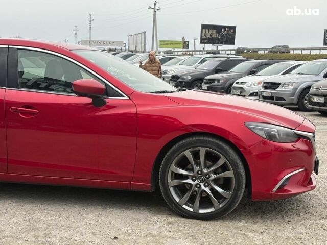 Красный Мазда 6, объемом двигателя 2.5 л и пробегом 270 тыс. км за 12640 $, фото 4 на Automoto.ua