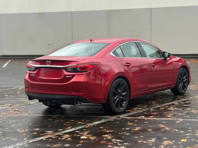 Красный Мазда 6, объемом двигателя 2.5 л и пробегом 75 тыс. км за 9000 $, фото 4 на Automoto.ua