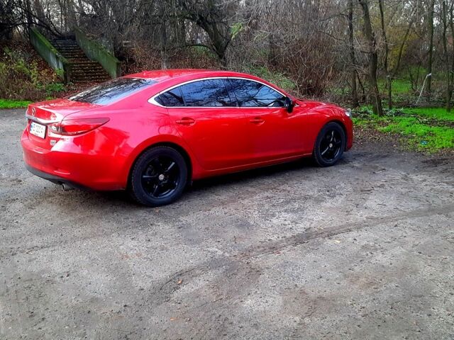 Красный Мазда 6, объемом двигателя 2.5 л и пробегом 147 тыс. км за 13200 $, фото 1 на Automoto.ua