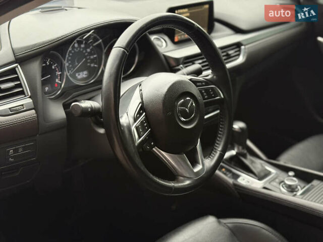 Красный Мазда 6, объемом двигателя 2.5 л и пробегом 190 тыс. км за 12500 $, фото 14 на Automoto.ua