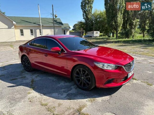 Красный Мазда 6, объемом двигателя 2.49 л и пробегом 198 тыс. км за 12550 $, фото 4 на Automoto.ua