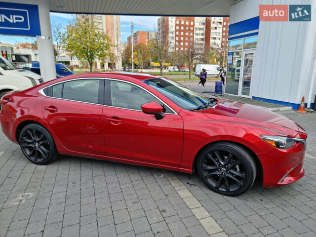 Красный Мазда 6, объемом двигателя 2.49 л и пробегом 320 тыс. км за 12000 $, фото 1 на Automoto.ua