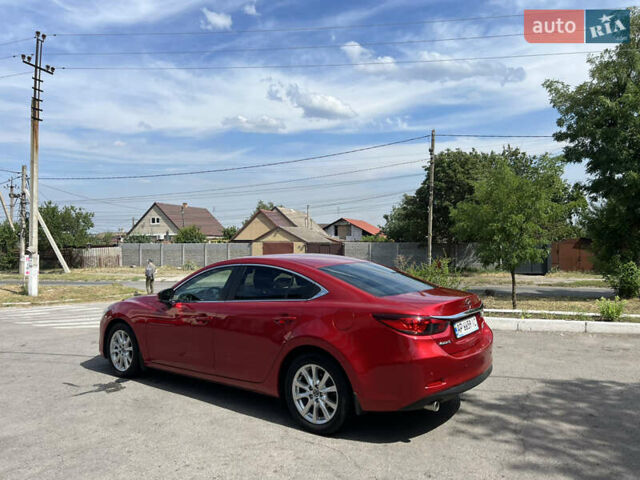 Красный Мазда 6, объемом двигателя 2 л и пробегом 101 тыс. км за 14900 $, фото 2 на Automoto.ua