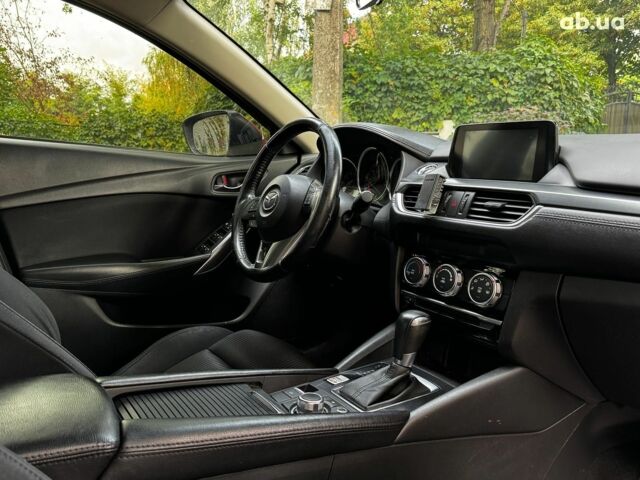 Червоний Мазда 6, об'ємом двигуна 2.5 л та пробігом 235 тис. км за 10640 $, фото 29 на Automoto.ua