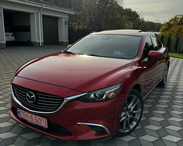 Красный Мазда 6, объемом двигателя 2.5 л и пробегом 107 тыс. км за 15500 $, фото 1 на Automoto.ua