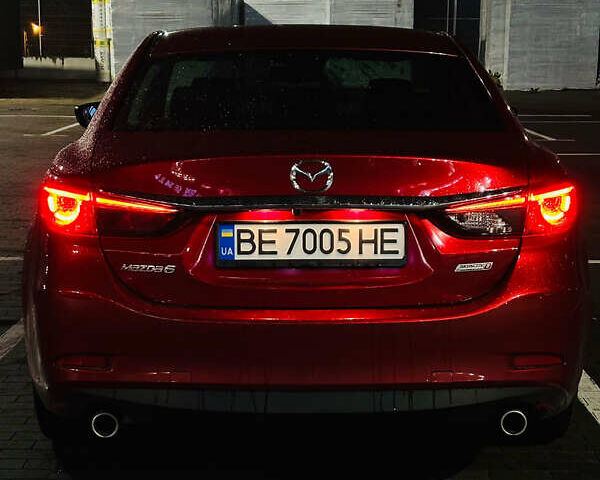Красный Мазда 6, объемом двигателя 2.19 л и пробегом 143 тыс. км за 15300 $, фото 1 на Automoto.ua