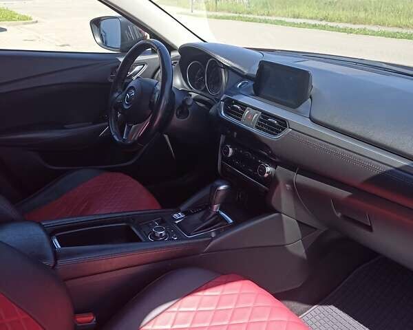 Красный Мазда 6, объемом двигателя 2 л и пробегом 70 тыс. км за 14990 $, фото 2 на Automoto.ua