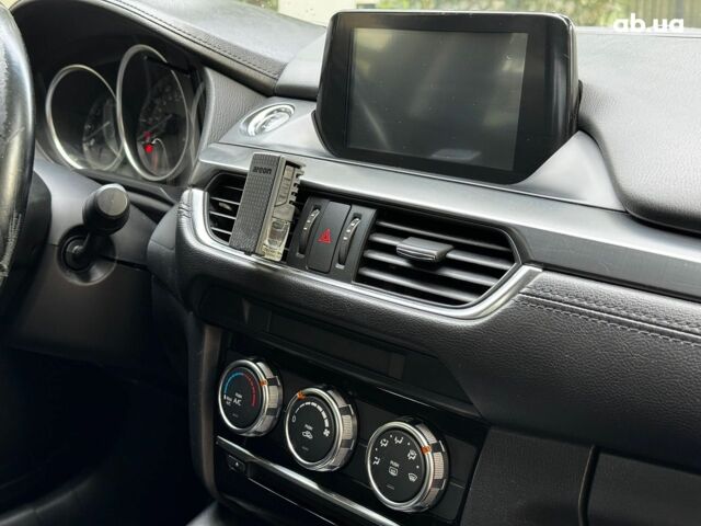 Червоний Мазда 6, об'ємом двигуна 2.5 л та пробігом 235 тис. км за 10640 $, фото 30 на Automoto.ua