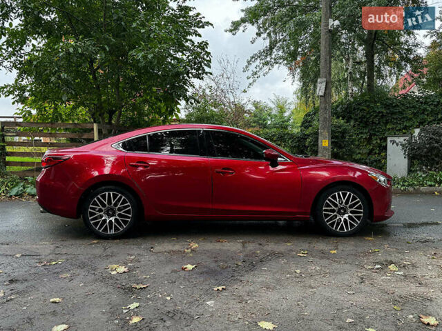 Червоний Мазда 6, об'ємом двигуна 2.5 л та пробігом 235 тис. км за 10640 $, фото 5 на Automoto.ua
