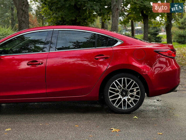 Червоний Мазда 6, об'ємом двигуна 2.5 л та пробігом 235 тис. км за 10640 $, фото 9 на Automoto.ua