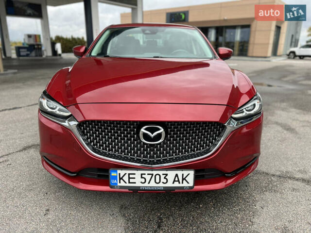 Красный Мазда 6, объемом двигателя 2.49 л и пробегом 104 тыс. км за 13700 $, фото 1 на Automoto.ua