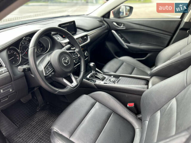 Красный Мазда 6, объемом двигателя 2.49 л и пробегом 104 тыс. км за 13700 $, фото 12 на Automoto.ua