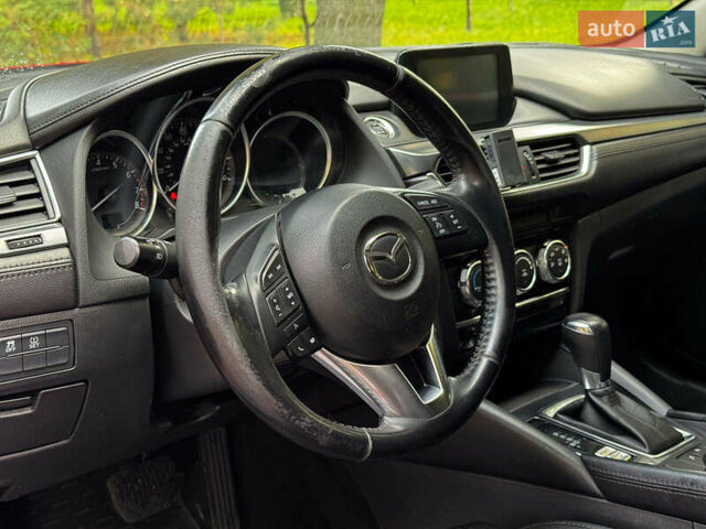 Червоний Мазда 6, об'ємом двигуна 2.5 л та пробігом 235 тис. км за 10640 $, фото 12 на Automoto.ua