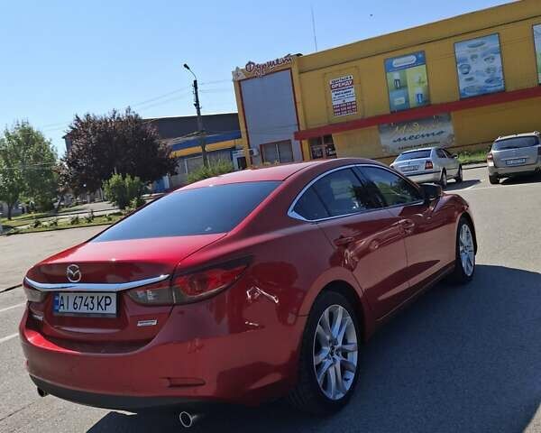 Красный Мазда 6, объемом двигателя 2.49 л и пробегом 167 тыс. км за 14300 $, фото 1 на Automoto.ua