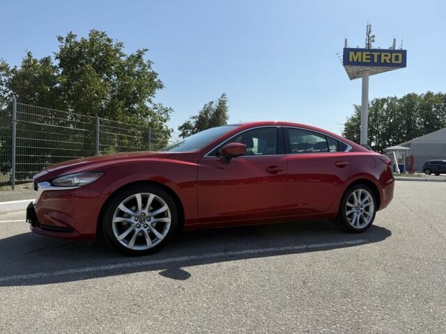 Красный Мазда 6, объемом двигателя 2.5 л и пробегом 104 тыс. км за 13299 $, фото 1 на Automoto.ua