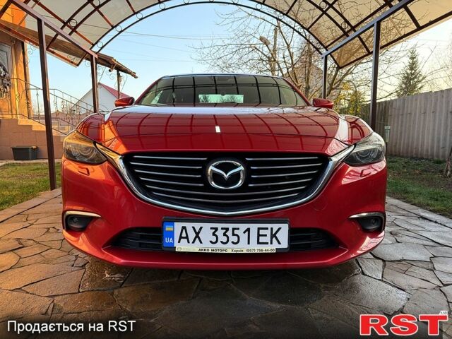 Красный Мазда 6, объемом двигателя 2.2 л и пробегом 50 тыс. км за 16999 $, фото 1 на Automoto.ua
