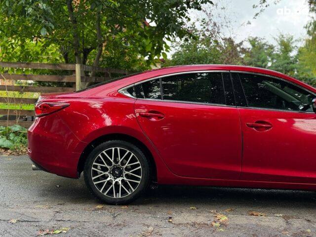 Червоний Мазда 6, об'ємом двигуна 2.5 л та пробігом 235 тис. км за 10640 $, фото 4 на Automoto.ua