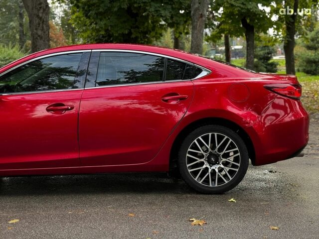 Червоний Мазда 6, об'ємом двигуна 2.5 л та пробігом 235 тис. км за 10640 $, фото 9 на Automoto.ua