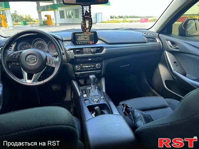 Красный Мазда 6, объемом двигателя 2 л и пробегом 120 тыс. км за 15100 $, фото 12 на Automoto.ua