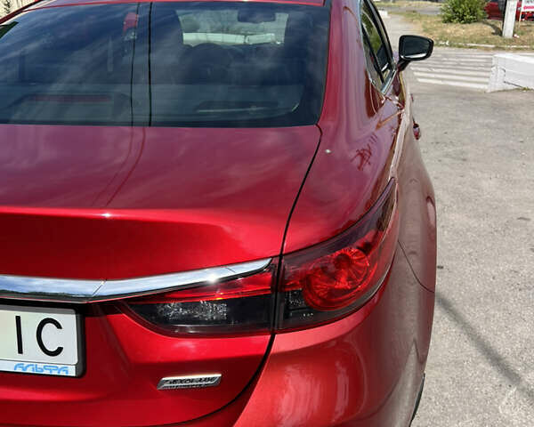 Красный Мазда 6, объемом двигателя 2 л и пробегом 101 тыс. км за 14900 $, фото 14 на Automoto.ua