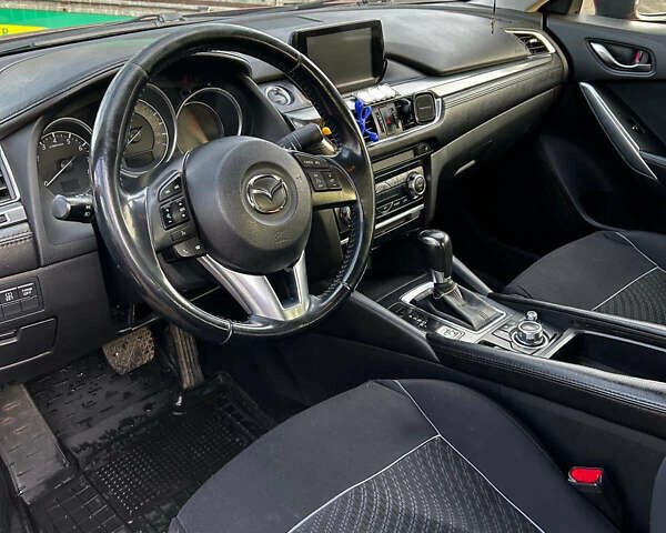 Красный Мазда 6, объемом двигателя 2 л и пробегом 204 тыс. км за 13000 $, фото 7 на Automoto.ua