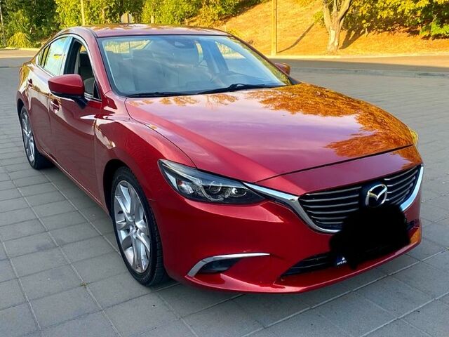 Красный Мазда 6, объемом двигателя 2.5 л и пробегом 170 тыс. км за 14499 $, фото 1 на Automoto.ua