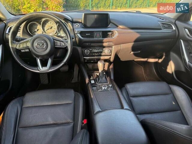 Красный Мазда 6, объемом двигателя 2.49 л и пробегом 205 тыс. км за 15200 $, фото 4 на Automoto.ua