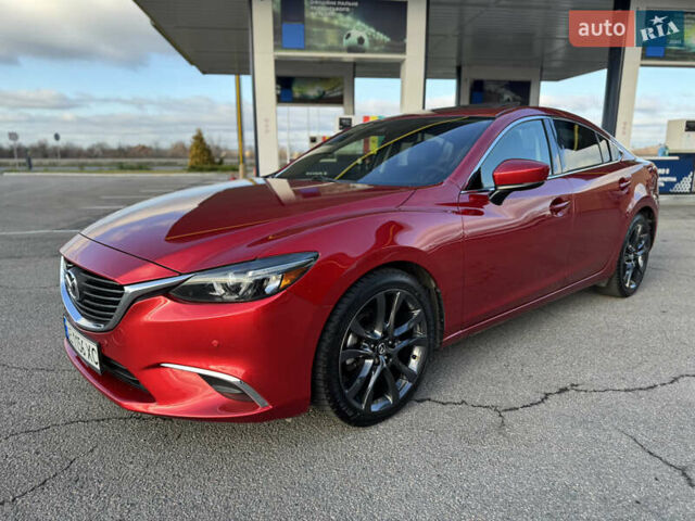 Красный Мазда 6, объемом двигателя 2.49 л и пробегом 145 тыс. км за 13650 $, фото 2 на Automoto.ua