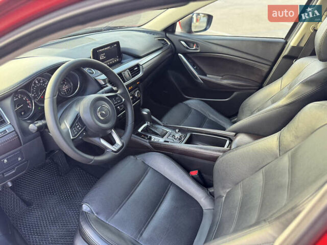 Красный Мазда 6, объемом двигателя 2.49 л и пробегом 145 тыс. км за 13650 $, фото 17 на Automoto.ua