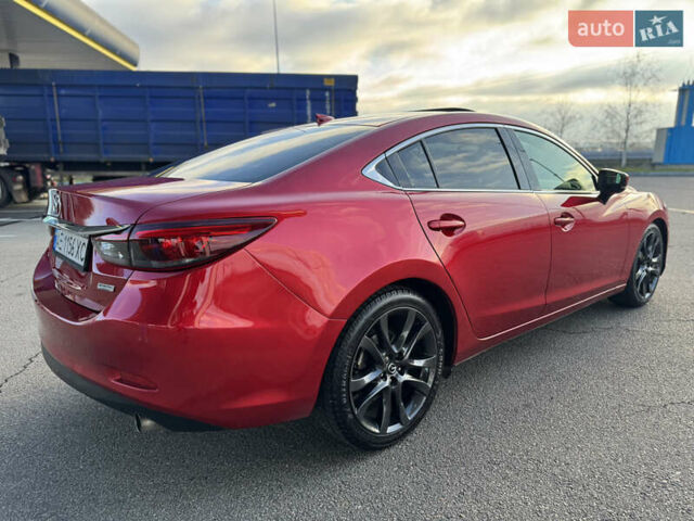 Красный Мазда 6, объемом двигателя 2.49 л и пробегом 145 тыс. км за 13650 $, фото 5 на Automoto.ua