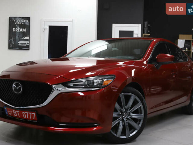 Красный Мазда 6, объемом двигателя 2.49 л и пробегом 70 тыс. км за 16900 $, фото 5 на Automoto.ua