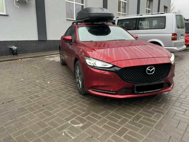 Красный Мазда 6, объемом двигателя 2.5 л и пробегом 99 тыс. км за 13000 $, фото 1 на Automoto.ua