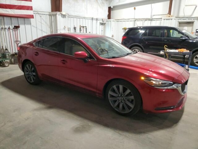 Красный Мазда 6, объемом двигателя 2.5 л и пробегом 125 тыс. км за 11700 $, фото 2 на Automoto.ua