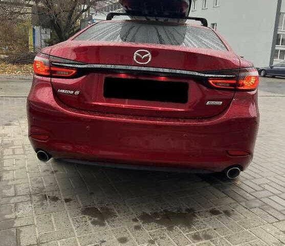Красный Мазда 6, объемом двигателя 2.5 л и пробегом 99 тыс. км за 13000 $, фото 4 на Automoto.ua