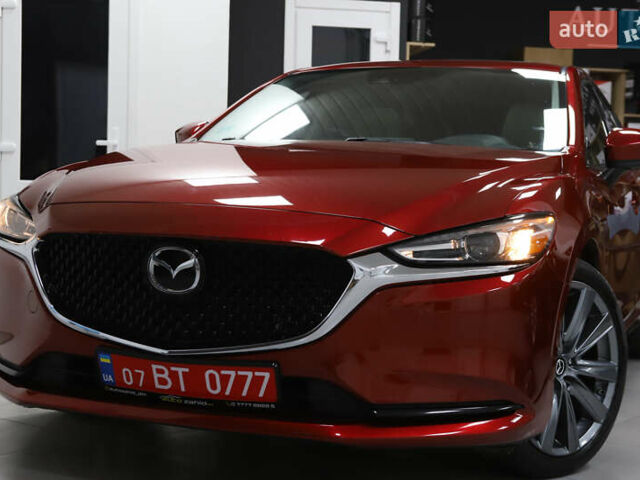 Красный Мазда 6, объемом двигателя 2.49 л и пробегом 70 тыс. км за 16900 $, фото 4 на Automoto.ua