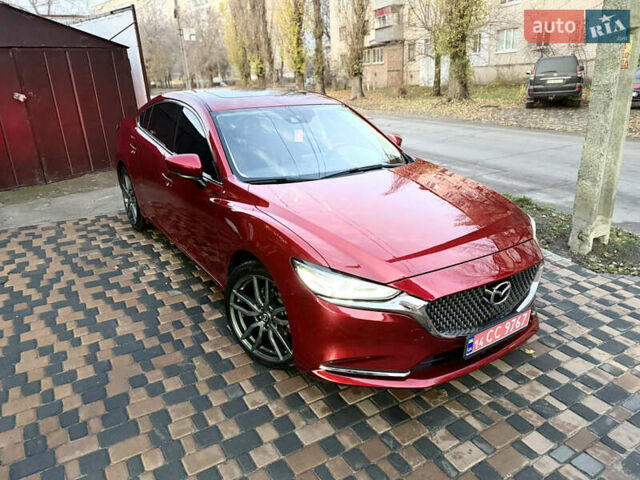 Красный Мазда 6, объемом двигателя 2.5 л и пробегом 97 тыс. км за 14500 $, фото 1 на Automoto.ua