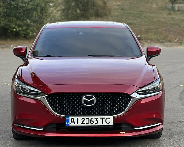 Красный Мазда 6, объемом двигателя 2.49 л и пробегом 98 тыс. км за 16900 $, фото 1 на Automoto.ua